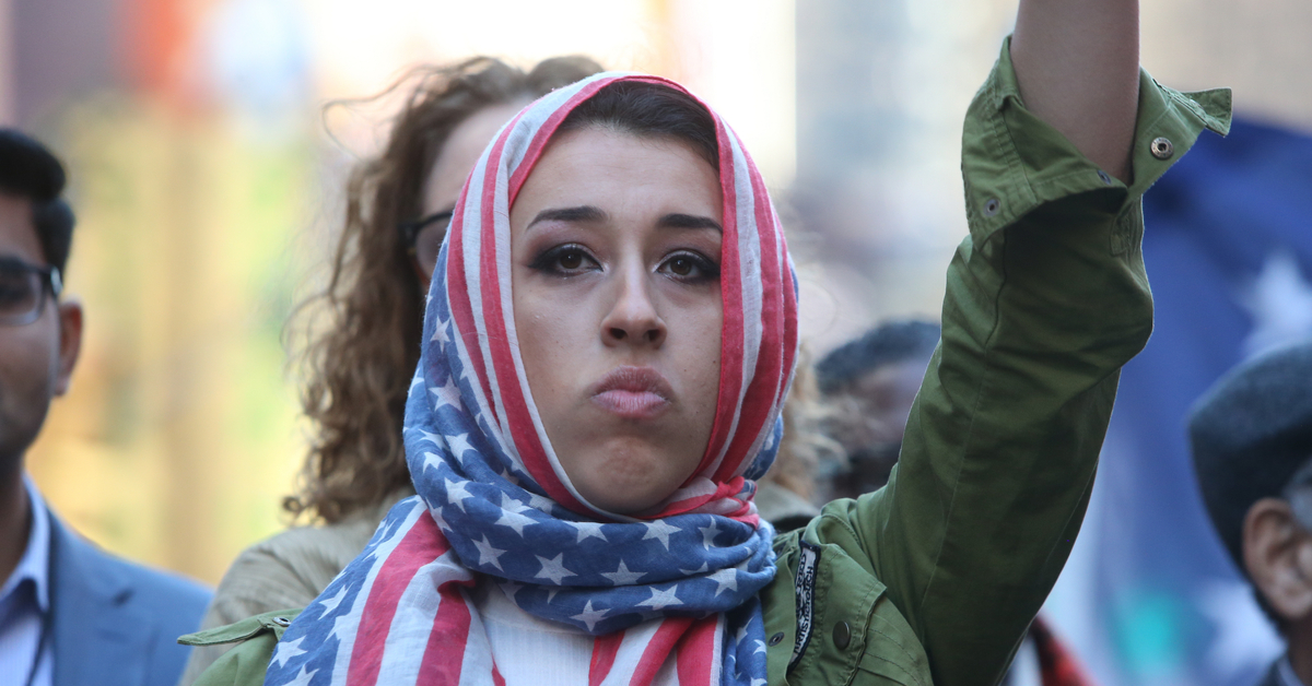 NEW YORK CITY - FEBRUARY 19 2017: A crowd estimated at 10,000 joined NYC Mayor Bill de Blasio during a rally against Trump's travel ban in Times Square. Credit: Shutterstock